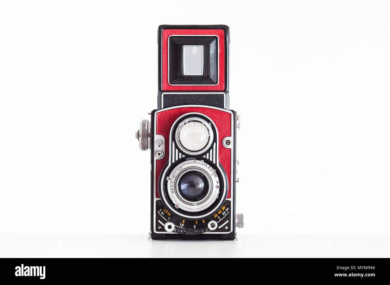 Isolated medium format analog 6x6 film camera in red without brand or logo`s Stock Photo